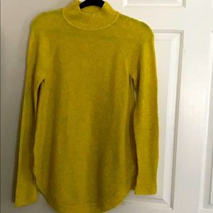 Mock neck bright yellow curved hem tunic sweater